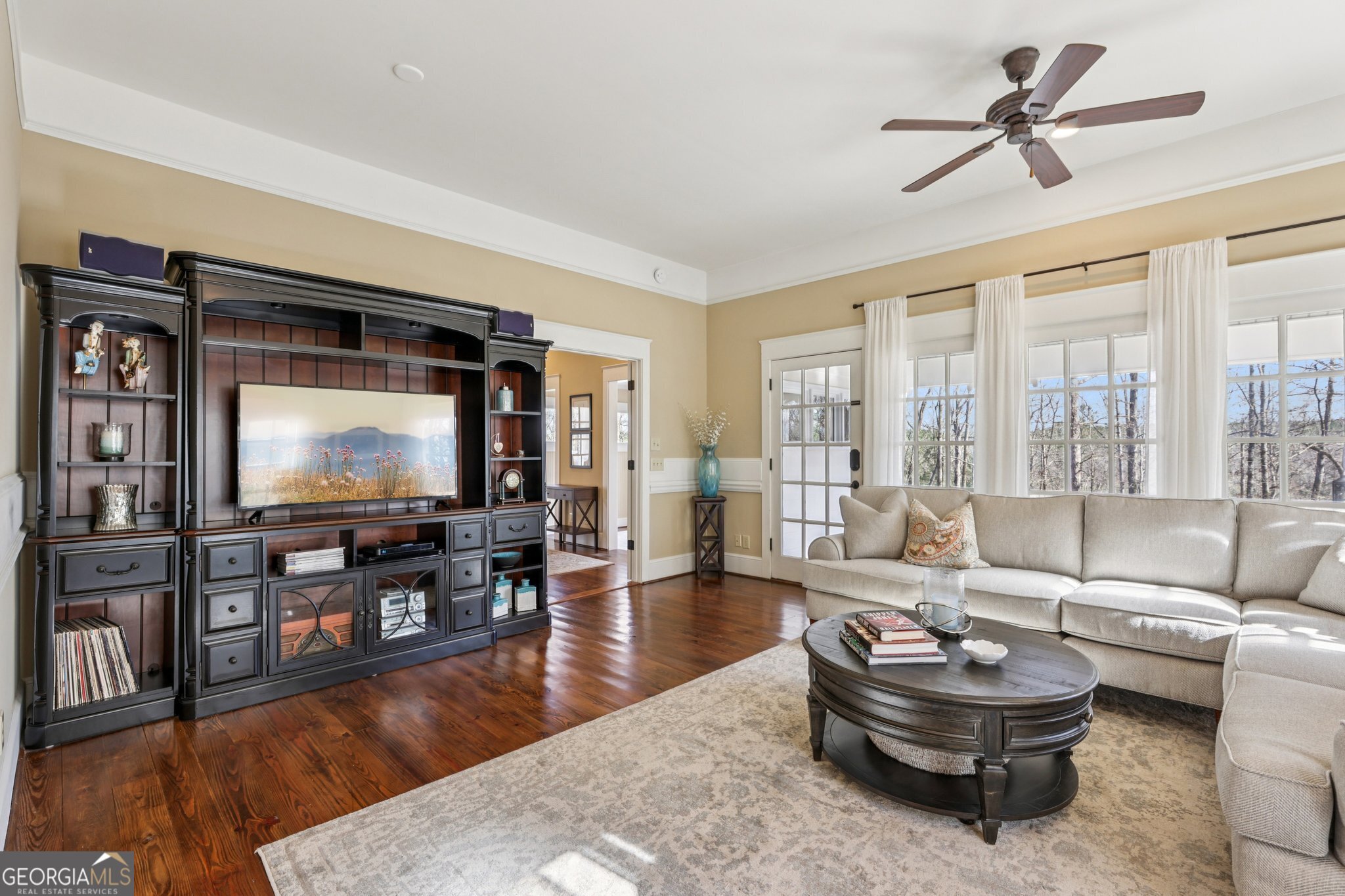 1015 Adams Road West Point, GA 31833 - Photo 30 of 108 a living room with furniture and a flat screen tv