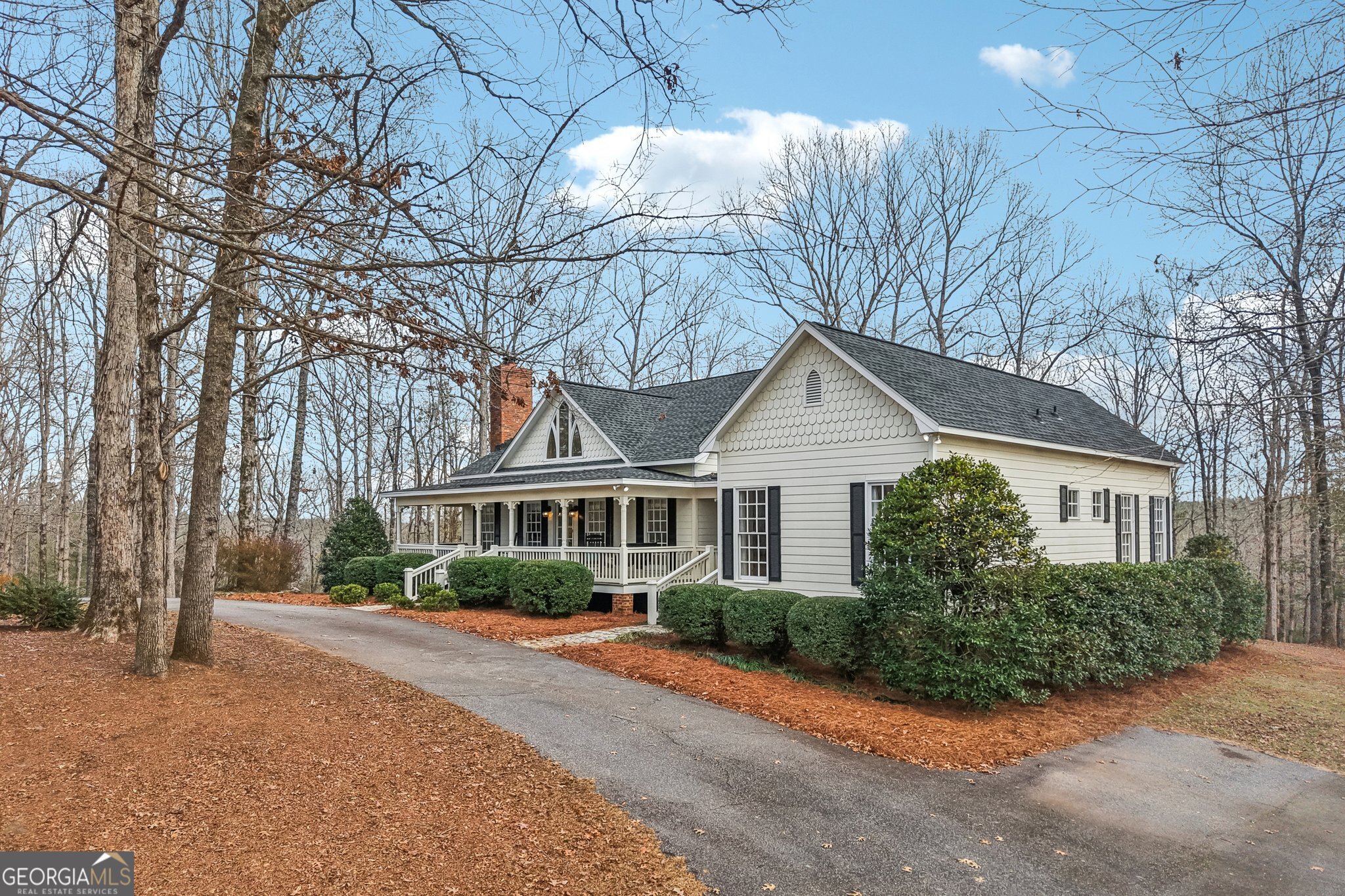 1015 Adams Road West Point, GA 31833 - Photo 3 of 108 a front view of a house with a yard and trees