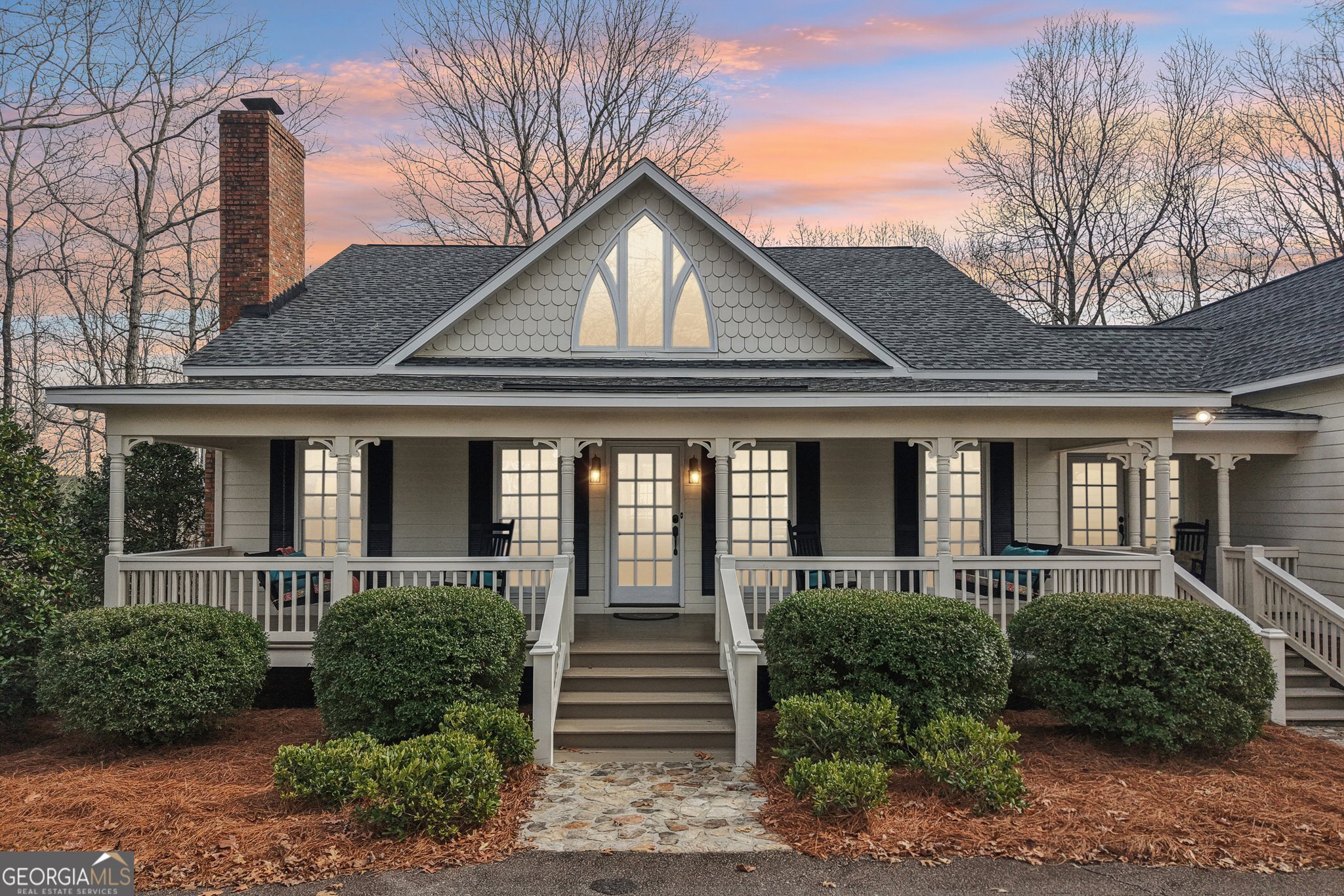 1015 Adams Road West Point, GA 31833 - Photo 4 of 108 a front view of a house with a garden