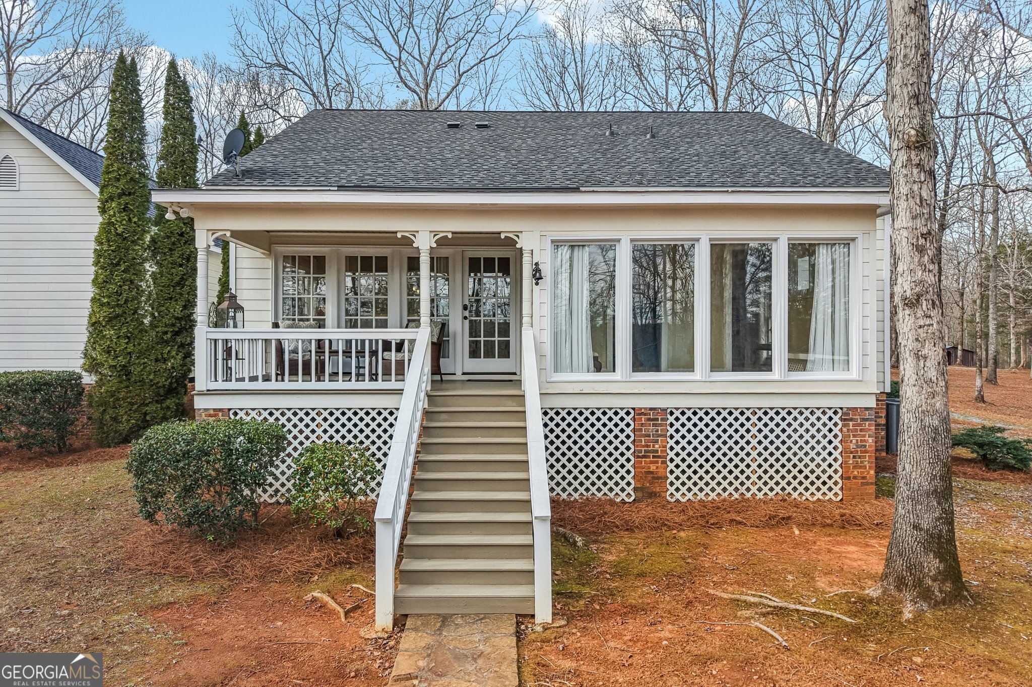 1015 Adams Road West Point, GA 31833 - Photo 59 of 108 a front view of a house with a garden