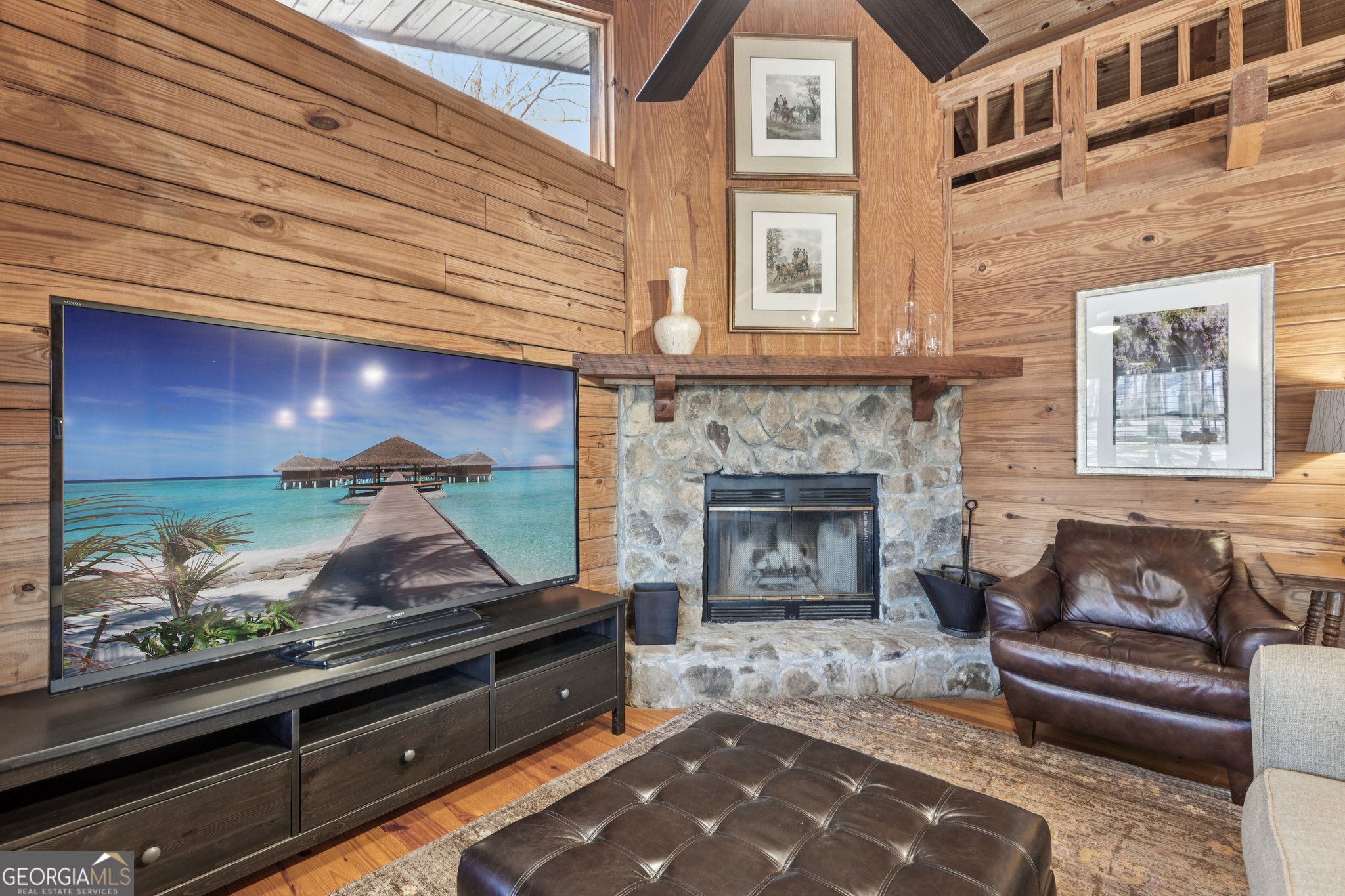 1015 Adams Road West Point, GA 31833 - Photo 78 of 108 a living room with furniture and a fireplace
