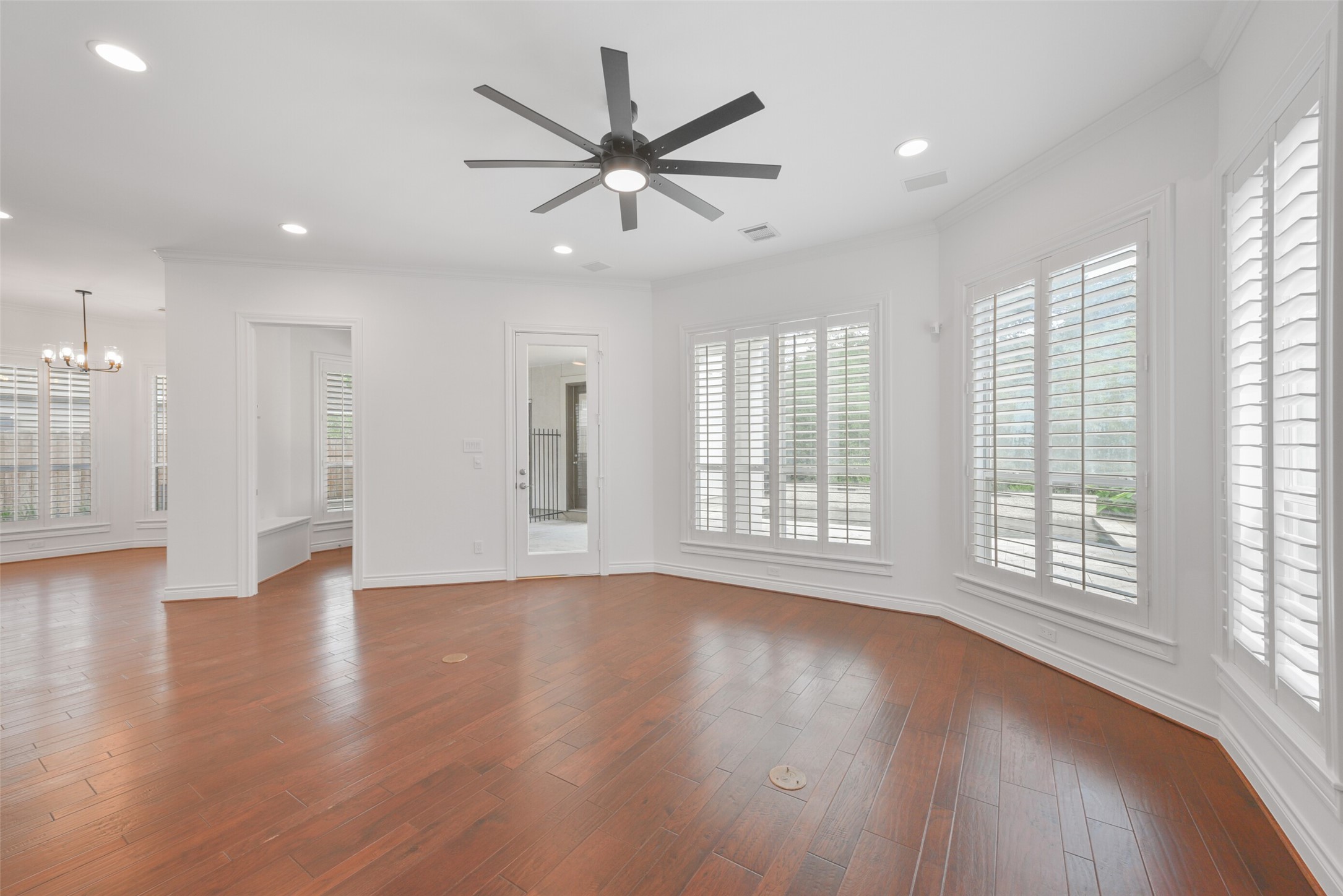 3724 Wroxton Road Houston, TX 77005 - Photo 12 of 40 View from the living room toward the breakfast room and mudroom. French door straight ahead leads to patio.