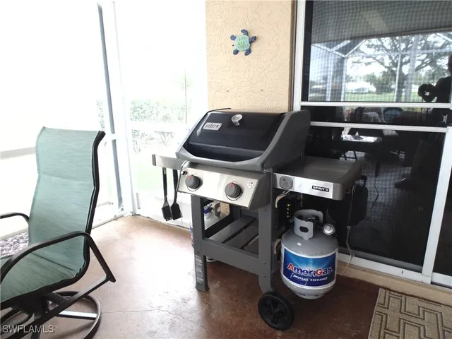 a view of a water with a large trees