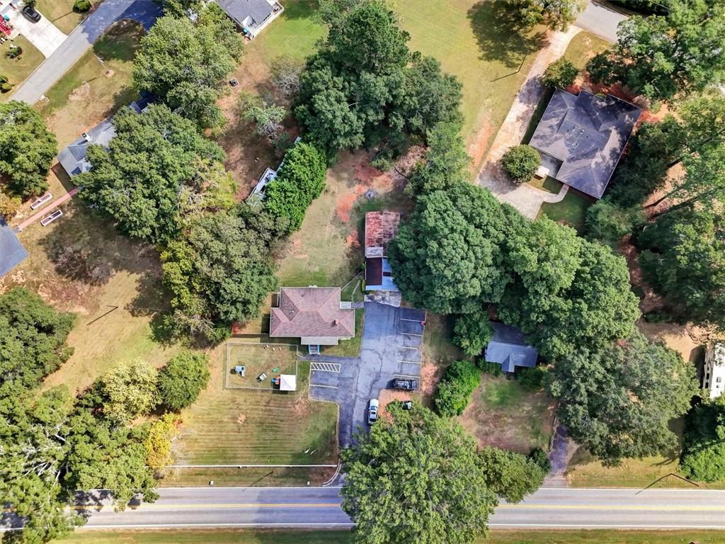 5099 Austell Powder Springs Road Southwest Austell, GA 30106 - Photo 38 of 38 an aerial view of a house with a yard