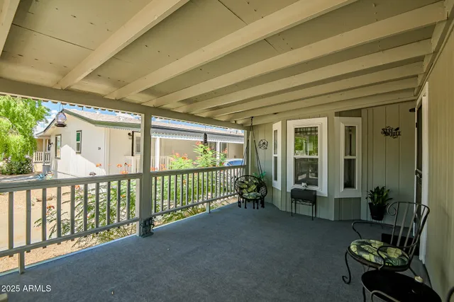 a view of porch with furniture