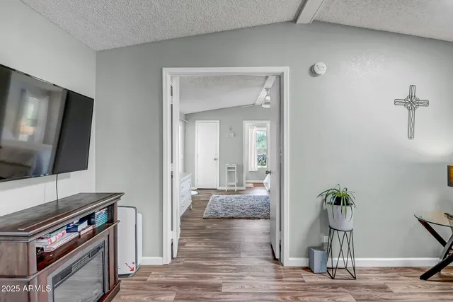a view of a livingroom with a flat screen tv