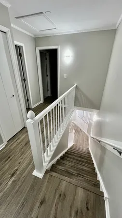 a view of entryway with wooden floor