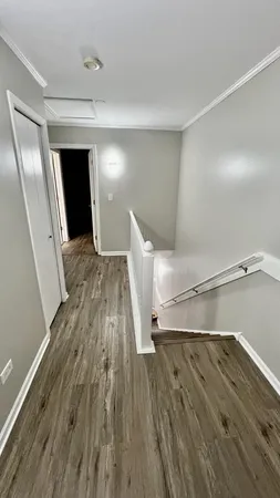 a view of entryway with wooden floor