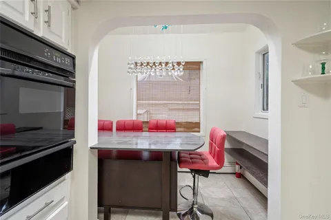 a kitchen with a stove and a microwave