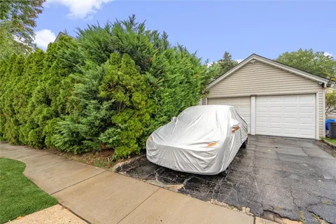 a view of a backyard of the house