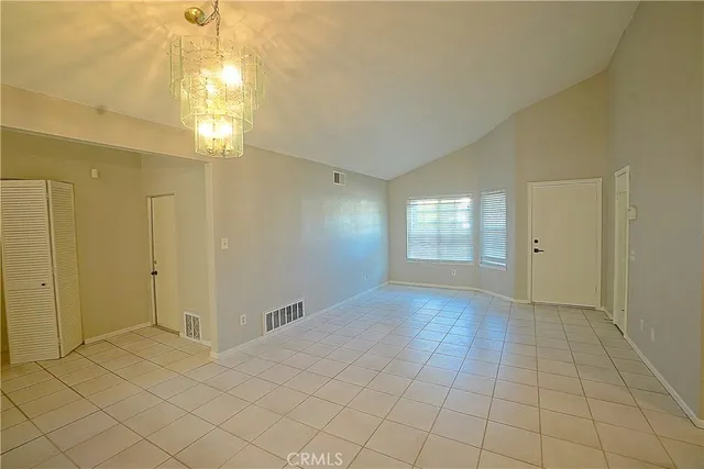 a view of an empty room and window