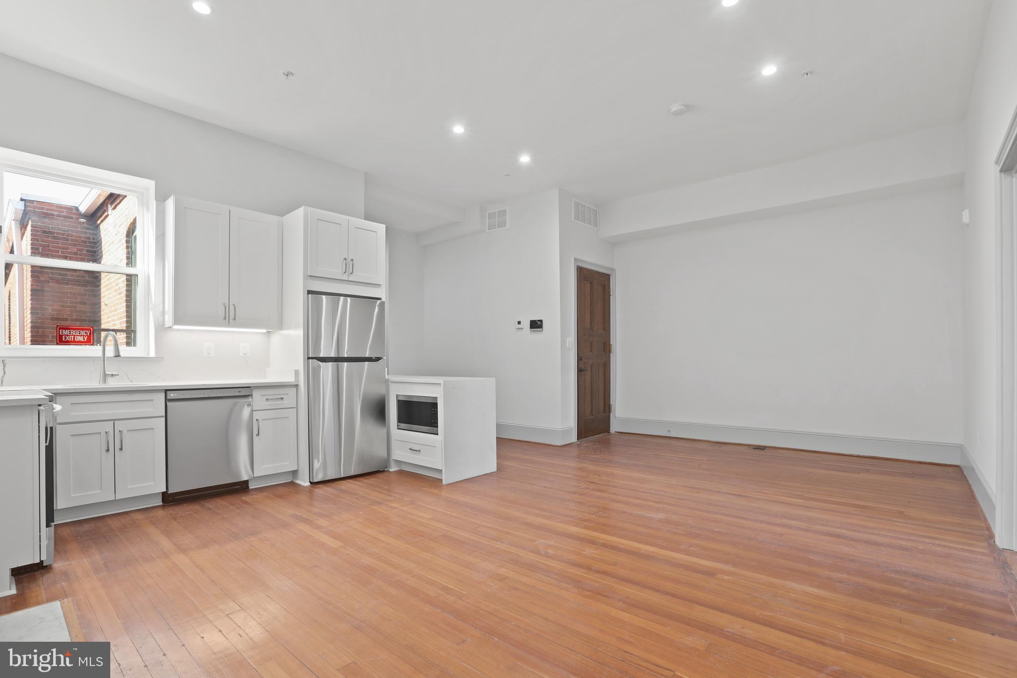 812 Park Avenue, Unit 3FF Baltimore, MD 21201 - Photo 10 of 17 a view of a kitchen with electric appliances