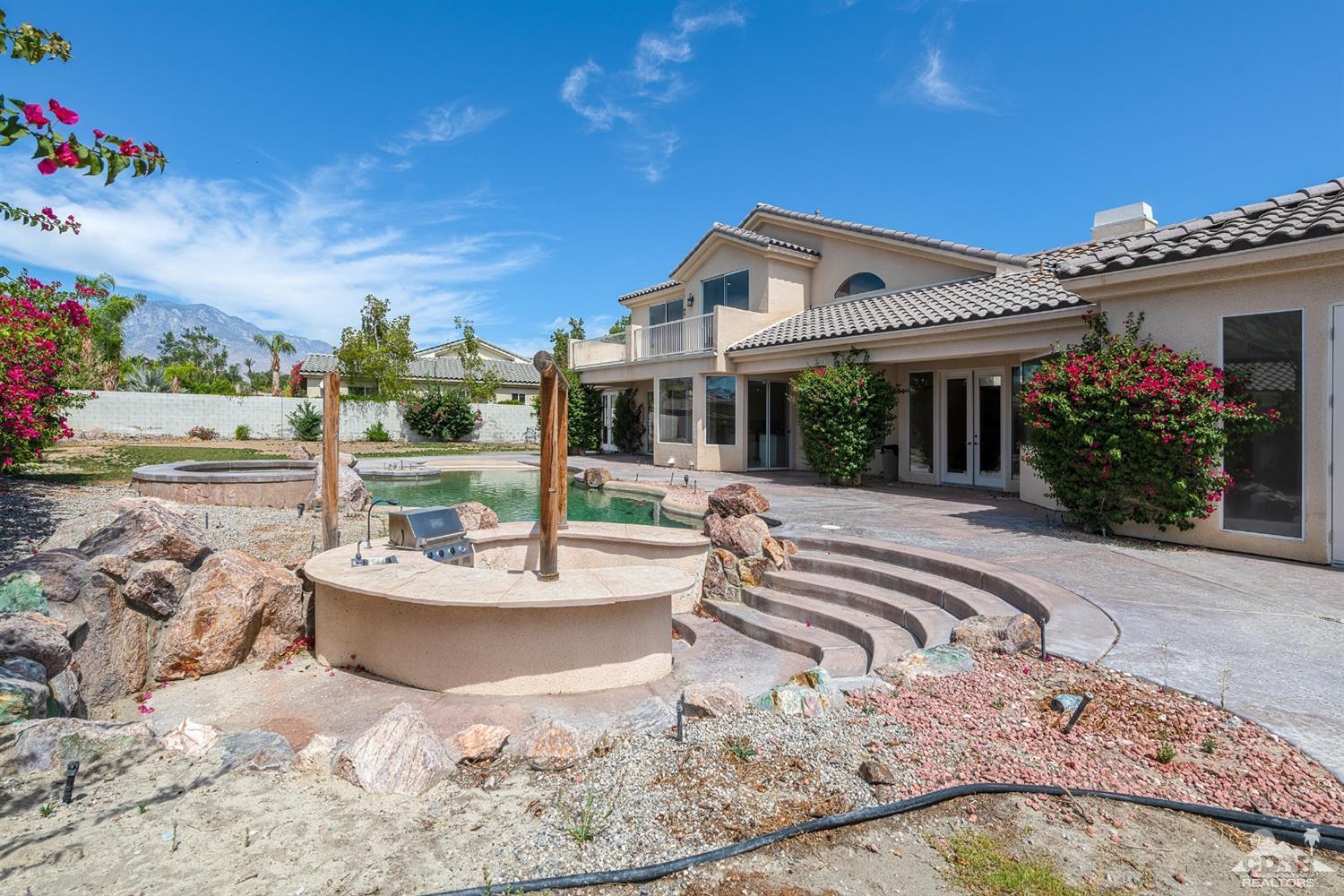35 Sherwood Road Rancho Mirage, CA 92270 - Photo 14 of 25 a view of a house with backyard and sitting area