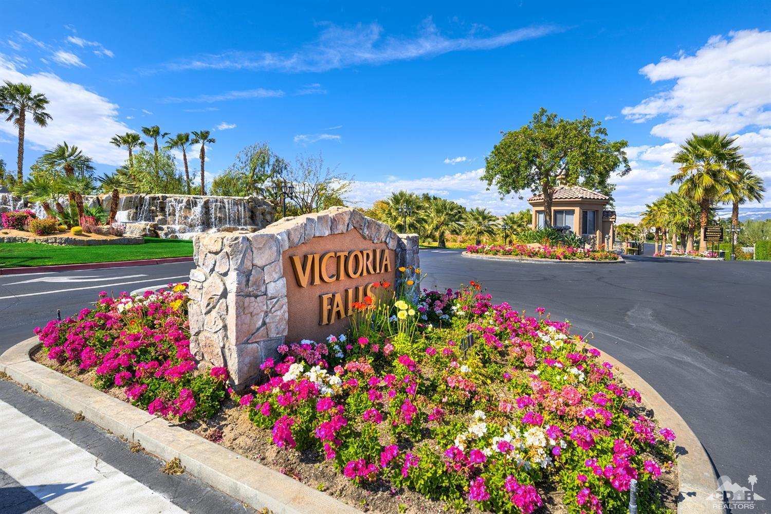 35 Sherwood Road Rancho Mirage, CA 92270 - Photo 23 of 25 a sign that is in front of flowers