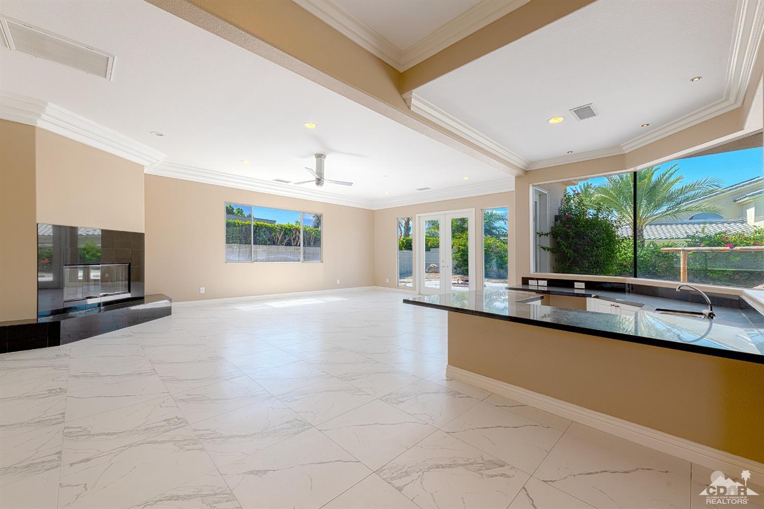 35 Sherwood Road Rancho Mirage, CA 92270 - Photo 7 of 25 a large kitchen with a large window