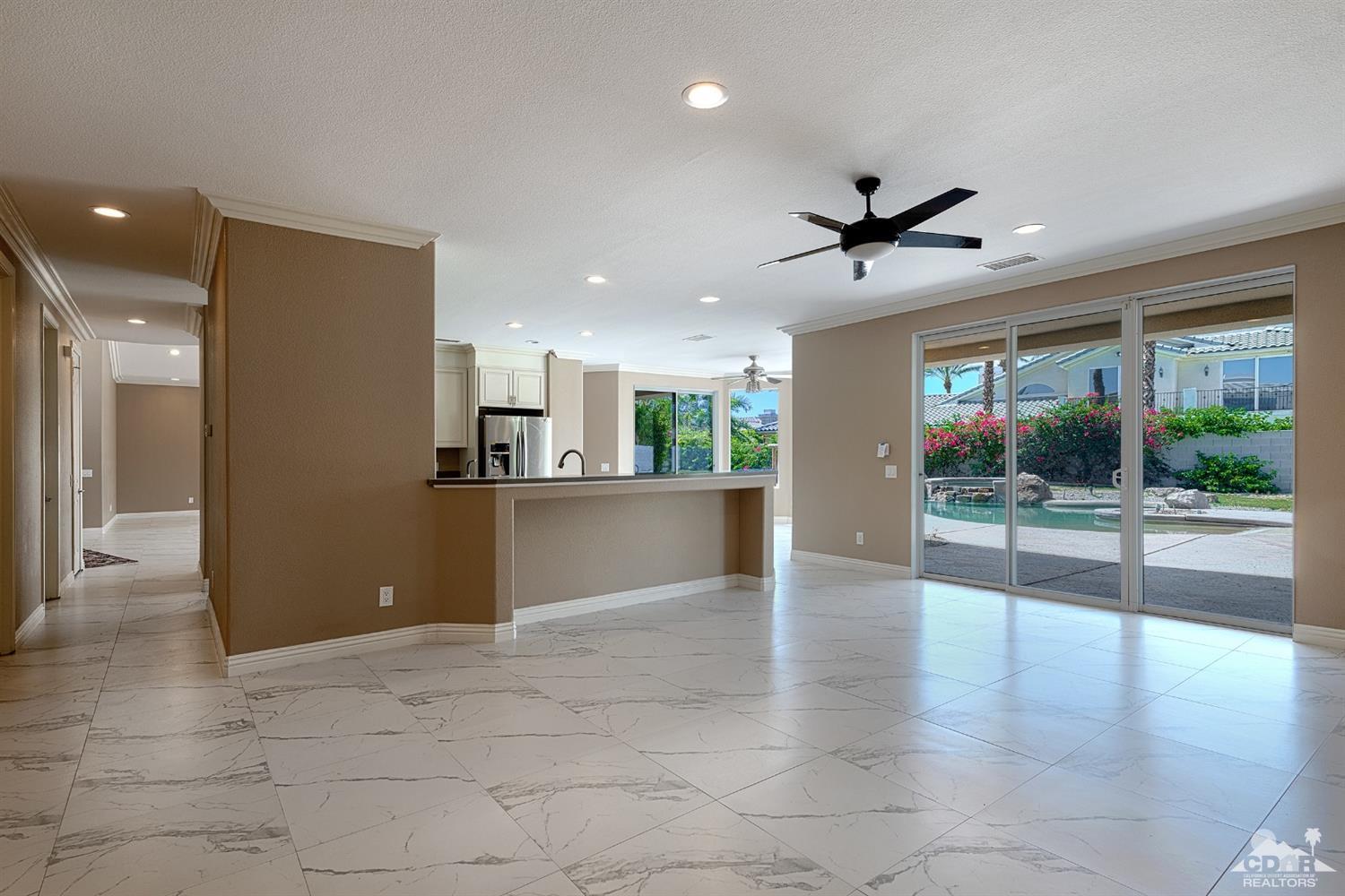 35 Sherwood Road Rancho Mirage, CA 92270 - Photo 8 of 25 a view of an empty room with a kitchen