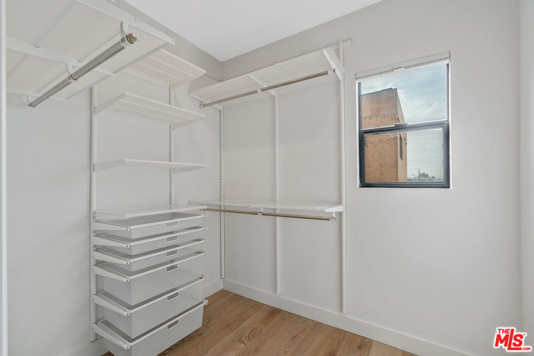 1645 South Sierra Bonita Avenue Los Angeles, CA 90019 - Photo 34 of 62 a view of an empty walk in closet