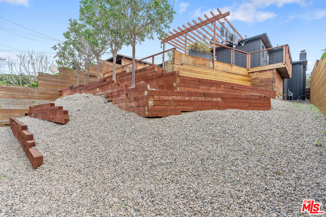 1645 South Sierra Bonita Avenue Los Angeles, CA 90019 - Photo 54 of 62 a view of a house with a snow