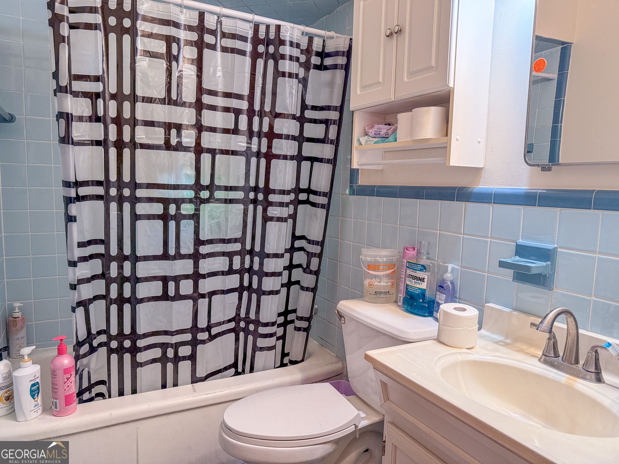 4303 Armour Road Columbus, GA 31904 - Photo 11 of 16 a bathroom with a sink toilet and shower