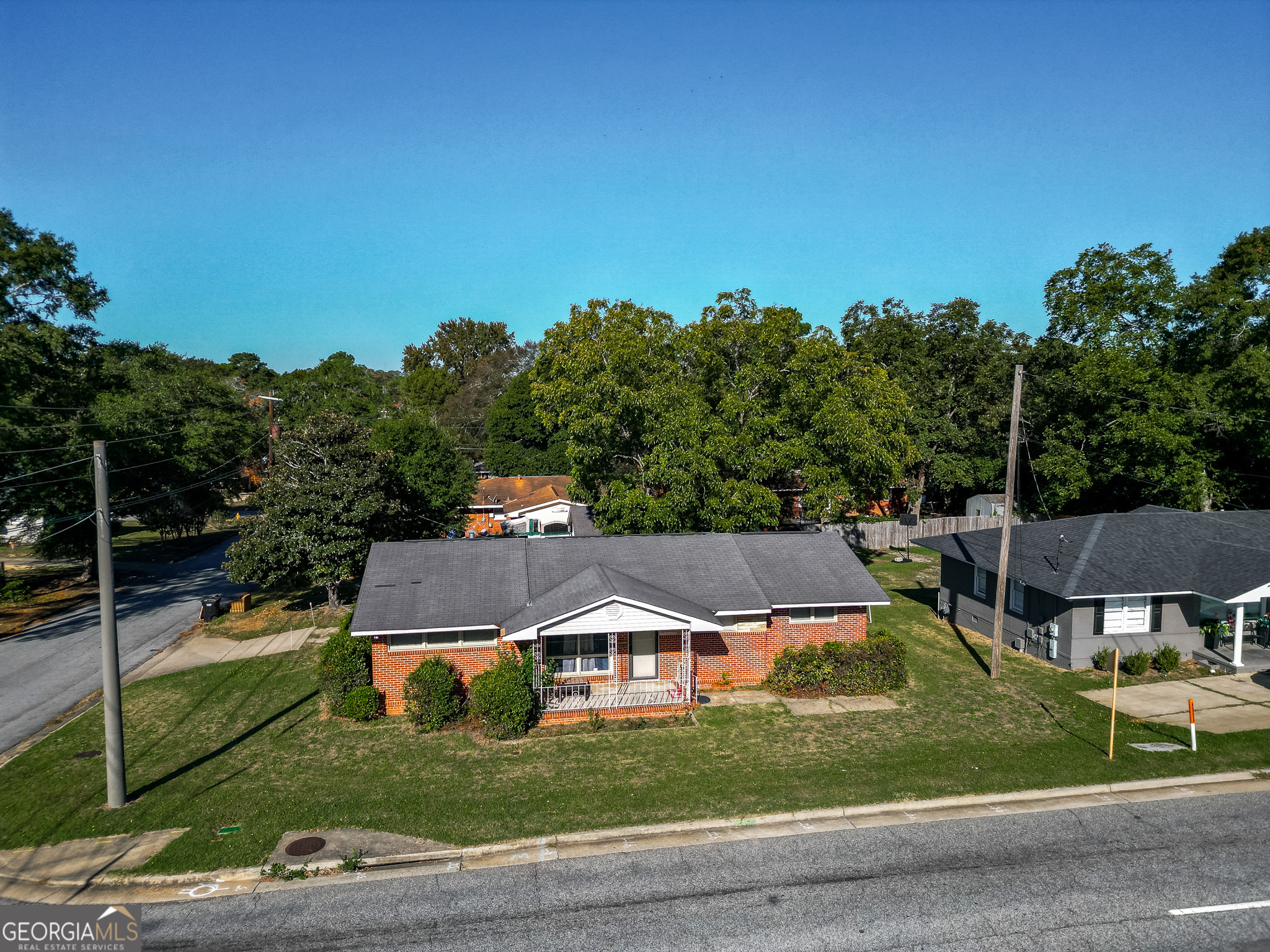 4303 Armour Road Columbus, GA 31904 - Photo 13 of 16 an aerial view of residential houses with outdoor space and trees