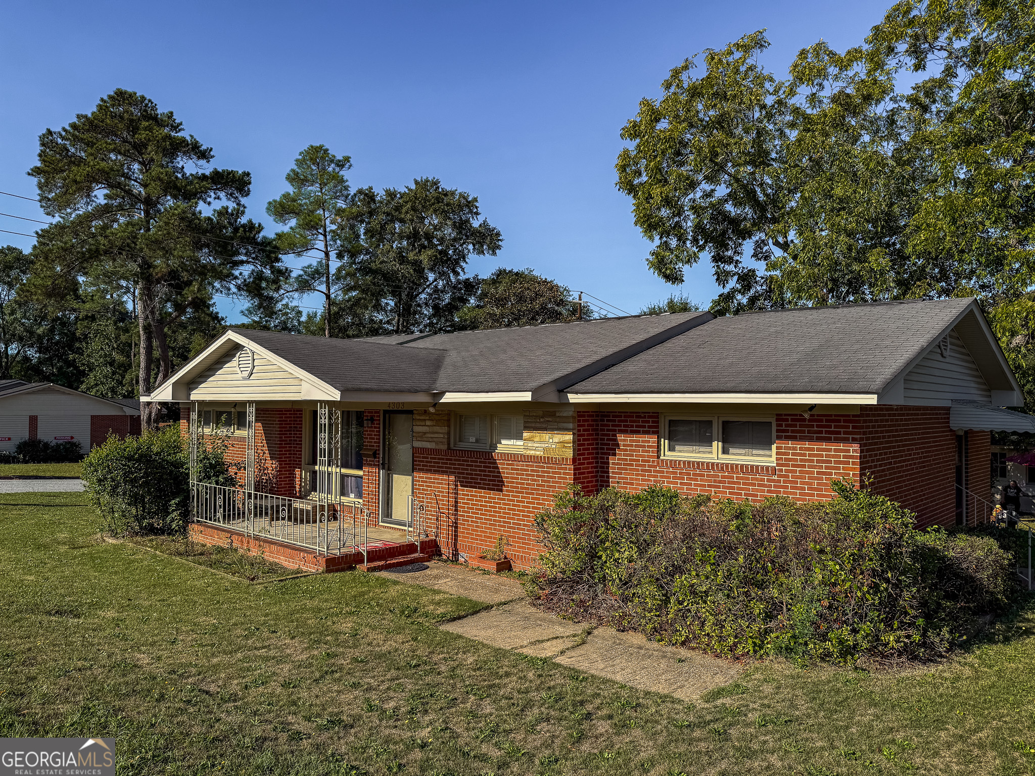 4303 Armour Road Columbus, GA 31904 - Photo 2 of 16 front view of a house with a yard