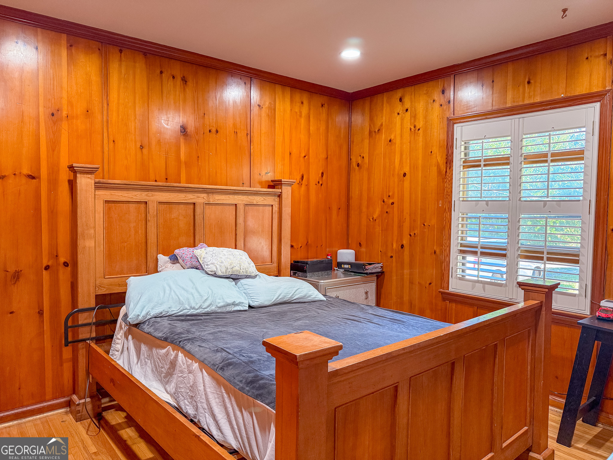 4303 Armour Road Columbus, GA 31904 - Photo 8 of 16 a bedroom with a bed and a table