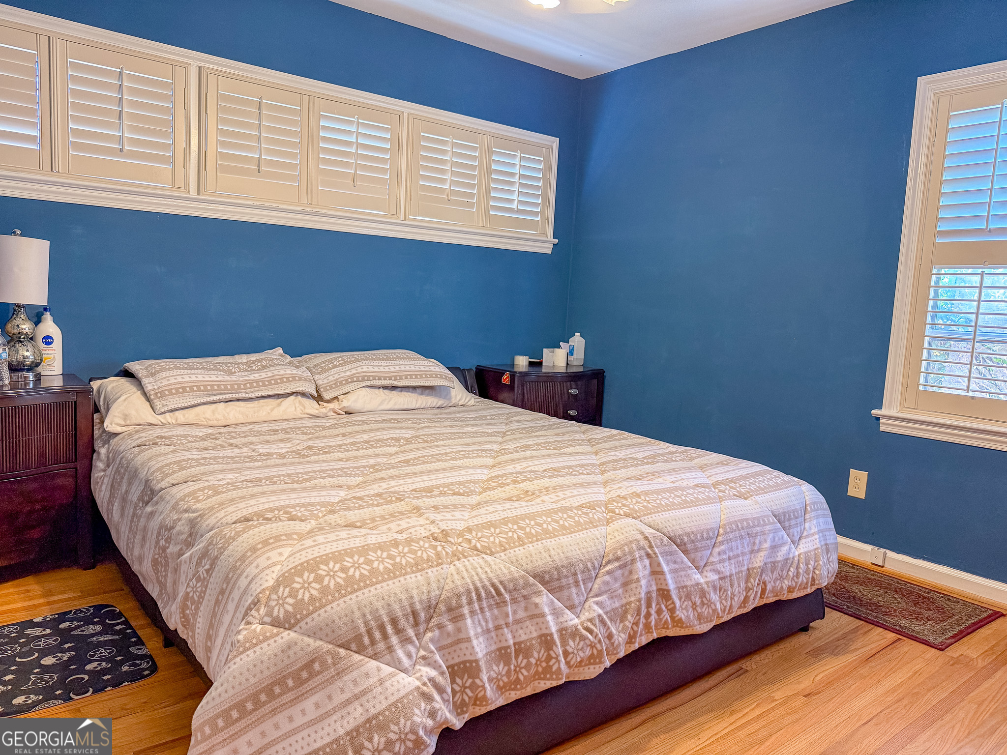 4303 Armour Road Columbus, GA 31904 - Photo 10 of 16 a large bed sitting in a bedroom next to a window