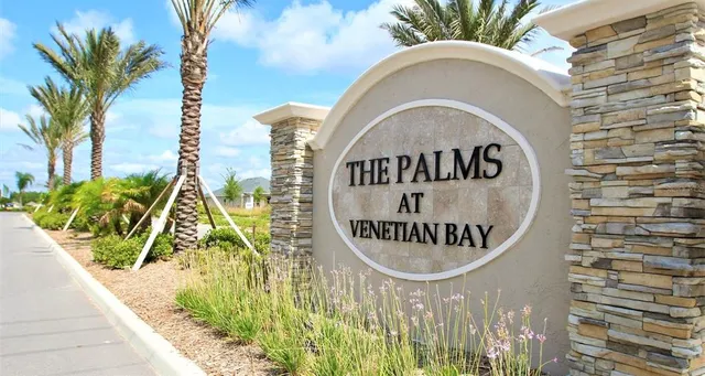 an aerial view of a house with a ocean view