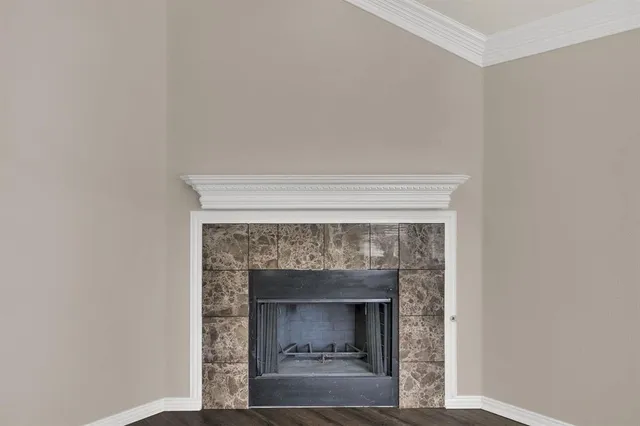 a living room with a fireplace