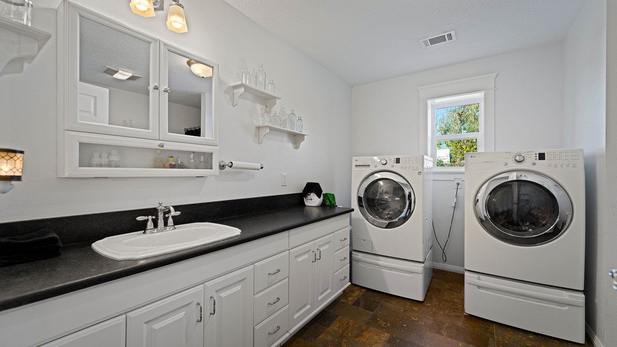 T-5 Providence Road Hearne, TX 77859 - Photo 21 of 39 a bathroom with a sink double vanity and a mirror