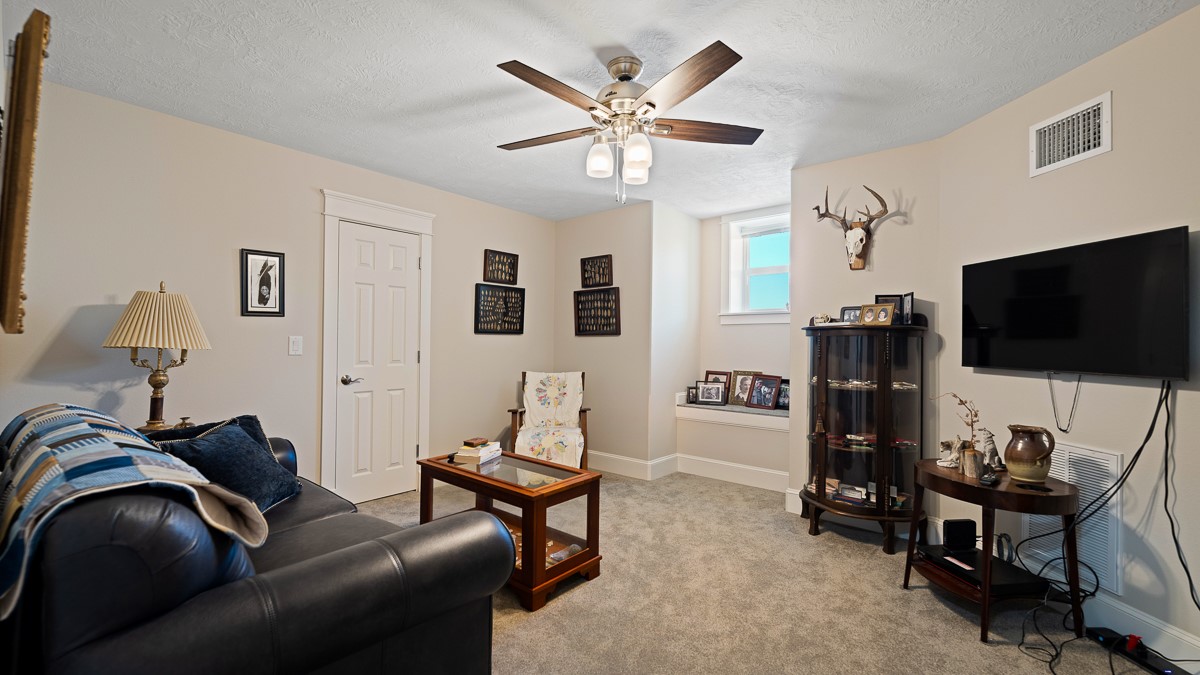 T-5 Providence Road Hearne, TX 77859 - Photo 25 of 39 a living room with furniture and a flat screen tv