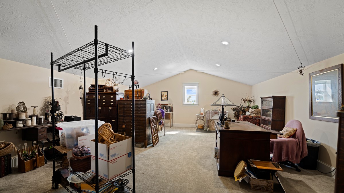 T-5 Providence Road Hearne, TX 77859 - Photo 26 of 39 a view of a workspace with furniture and a livingroom