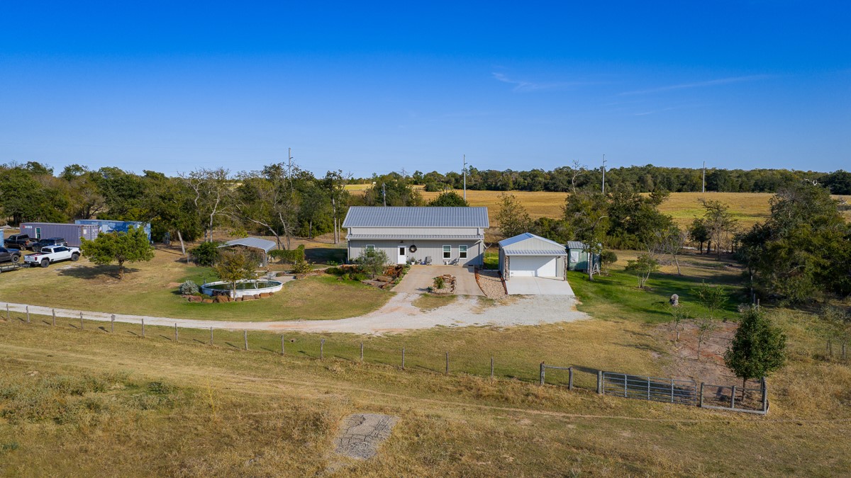 T-5 Providence Road Hearne, TX 77859 - Photo 3 of 39 a view of a swimming pool with a yard