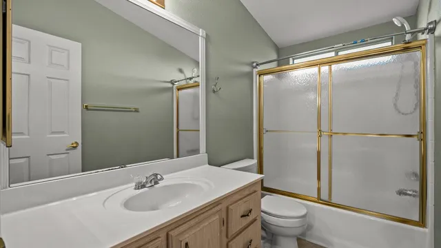 a view of a room with a hallway