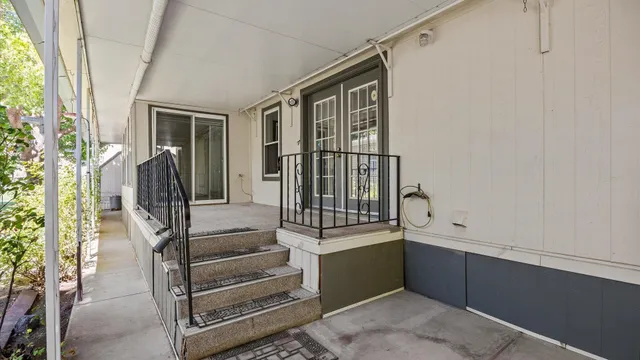 a view of walk in closet and window