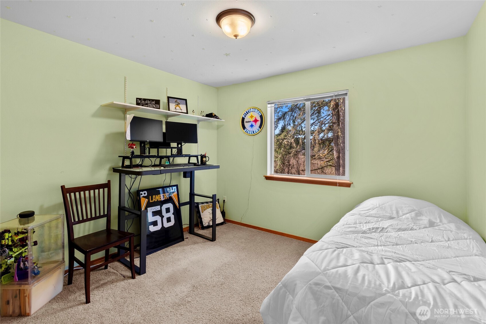 3349 68th Avenue Southwest Olympia, WA 98512 - Photo 24 of 36 a bedroom with furniture and a bed