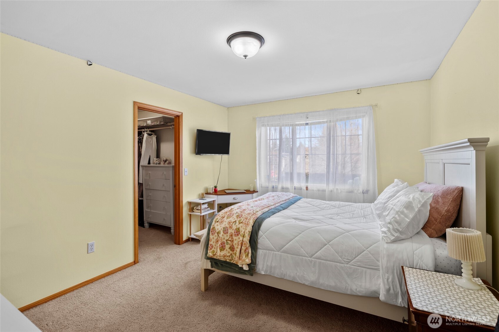 3349 68th Avenue Southwest Olympia, WA 98512 - Photo 25 of 36 a bedroom with a bed and a television