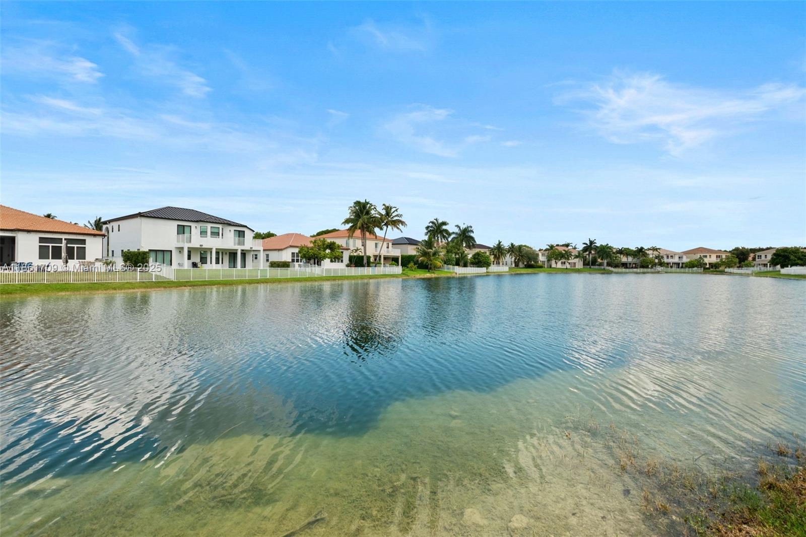 5168 Southwest 157th Avenue Miramar, FL 33027 - Photo 29 of 30 a view of a lake with houses