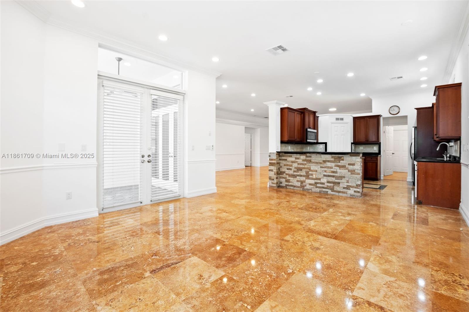 5168 Southwest 157th Avenue Miramar, FL 33027 - Photo 6 of 30 a view of kitchen and kitchen with granite countertop cabinets