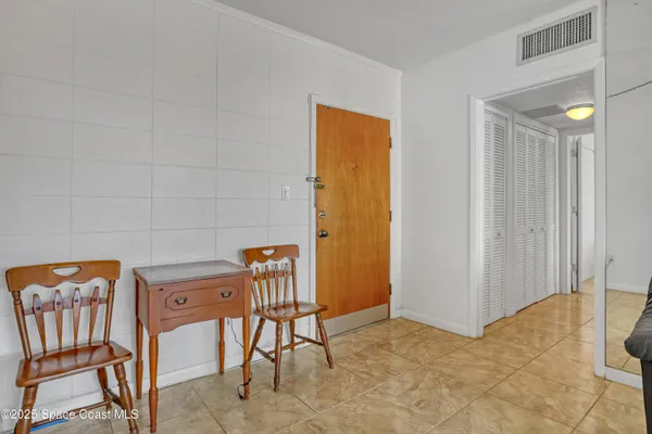 a table and chairs in a room