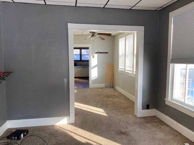 518 East Cleveland Street Spring Valley, IL 61362 - Photo 3 of 9 a view of empty room with windows