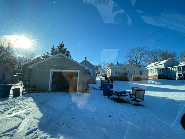 518 East Cleveland Street Spring Valley, IL 61362 - Photo 9 of 9 a backyard of a house with table and chairs