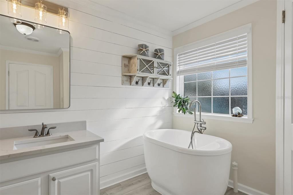 755 Colgate Road Venice, FL 34293 - Photo 24 of 53 a bathroom with a bathtub and sink