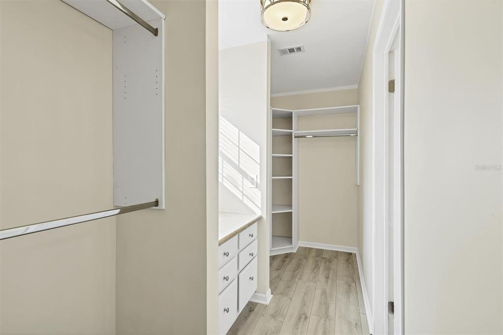 755 Colgate Road Venice, FL 34293 - Photo 25 of 53 a view of walk in closet with empty racks