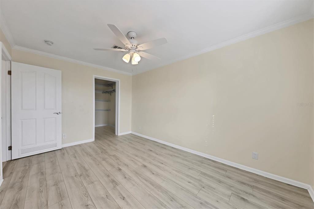 755 Colgate Road Venice, FL 34293 - Photo 29 of 53 a view of empty room with wooden floor