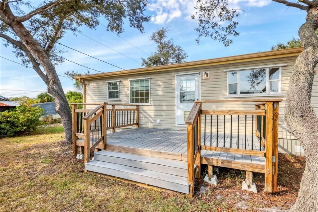 755 Colgate Road Venice, FL 34293 - Photo 32 of 53 a front view of a house with a porch