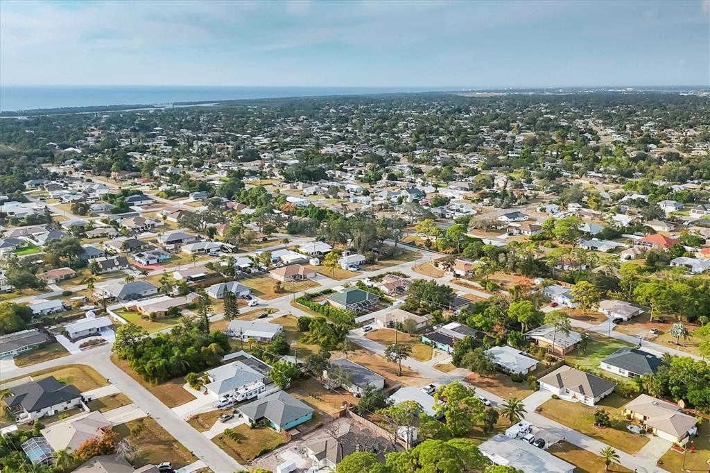755 Colgate Road Venice, FL 34293 - Photo 40 of 53 an aerial view of residential building and ocean