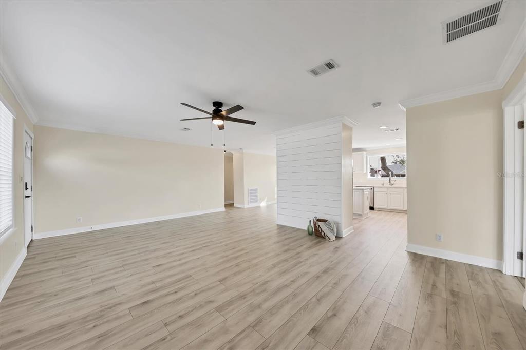 755 Colgate Road Venice, FL 34293 - Photo 7 of 53 a view of a room with wooden floor