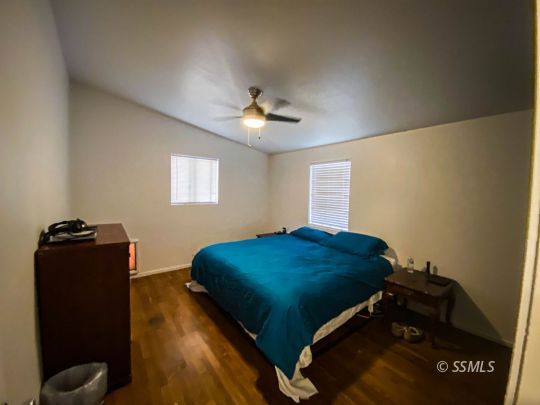 333 North Helena Street Ridgecrest, CA 93555 - Photo 13 of 35 a bedroom with a bed and window