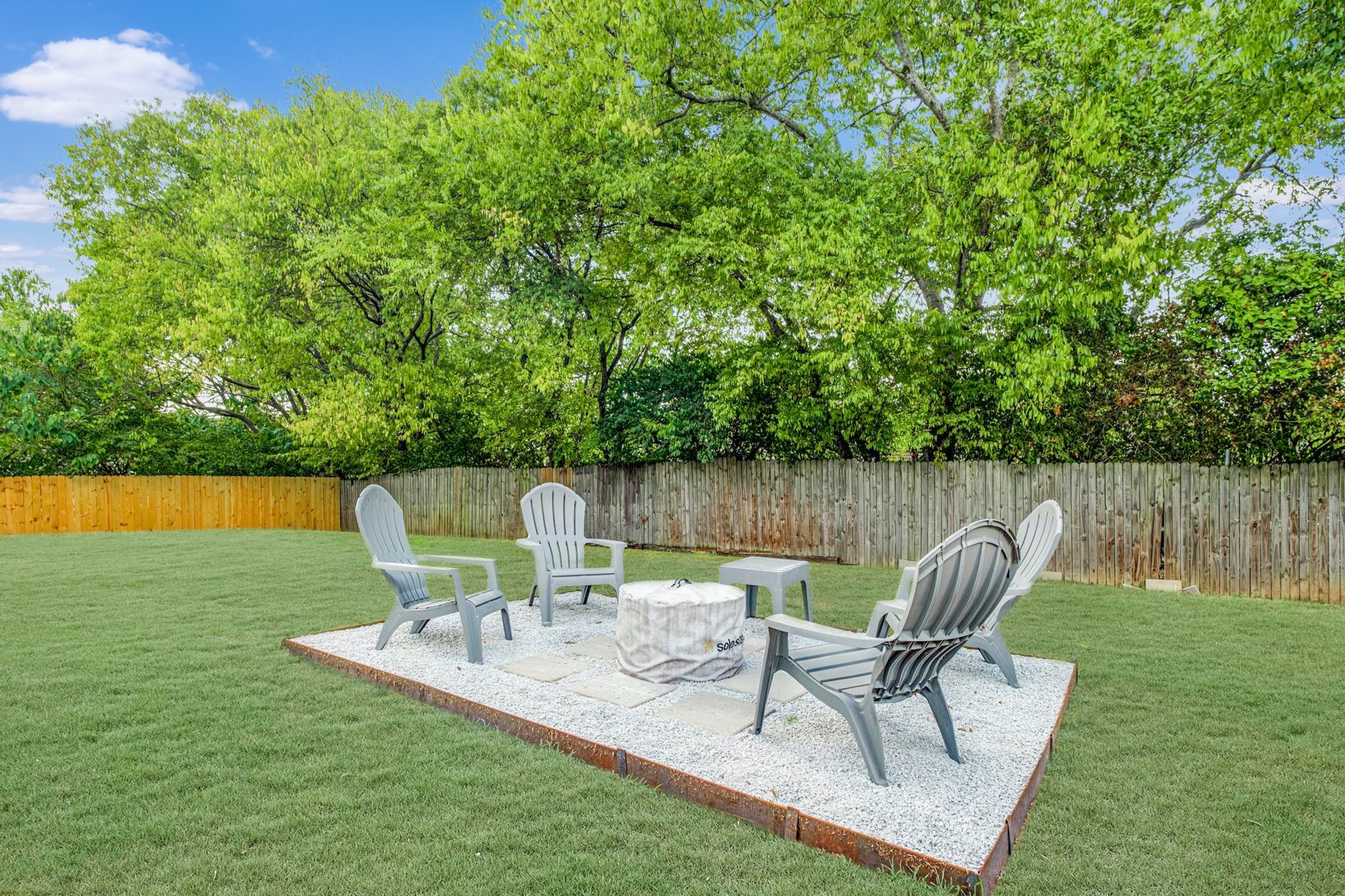 562 B Neelys Bend Road Madison, TN 37115 - Photo 21 of 29 a view of a chairs and table in the yard